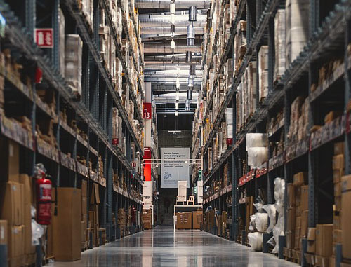 well-stocked warehouse shelves